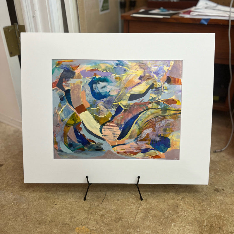 Abstract painting matted on an easel