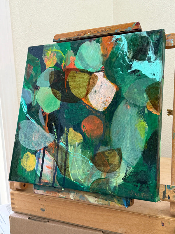 Abstract painting with vibrant colors on a canvas.