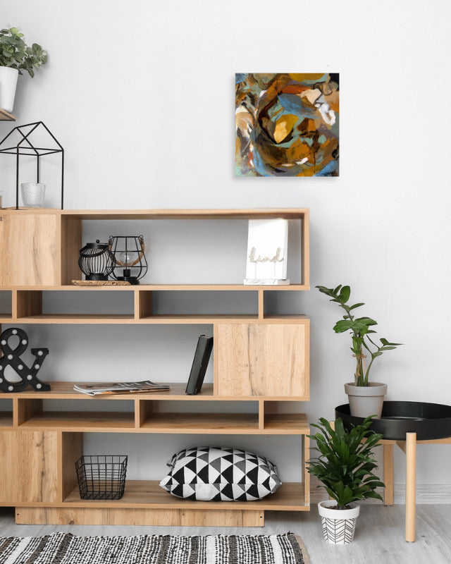 Modern living room with wooden furniture and abstract art