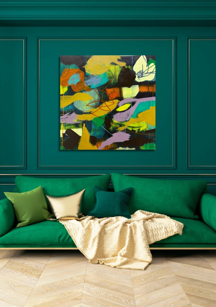 Large square abstract painting in blue room above green sofa