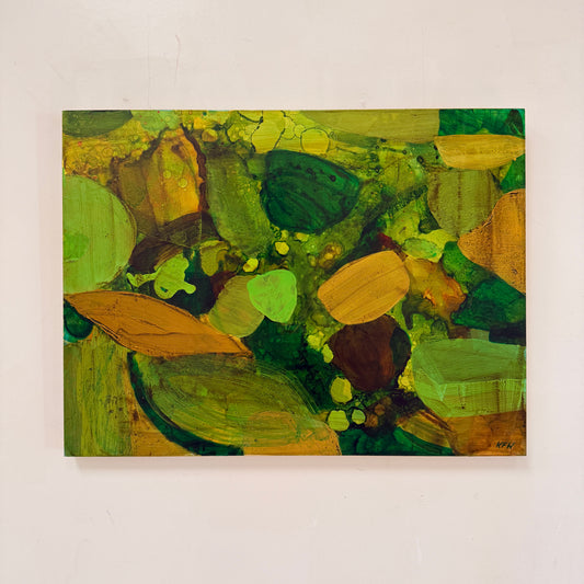 Abstract painting with green and brown tones on a white wall
